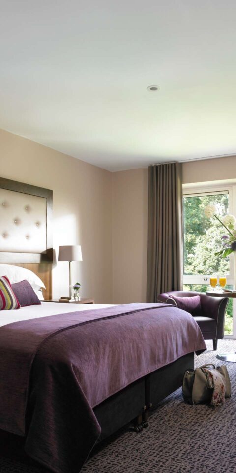 Deluxe Room bedroom at Dunboyne Castle Hotel &amp; Spa in County Meath.